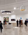 Geometric ten-angled SUN Chandelier illuminating gallery space