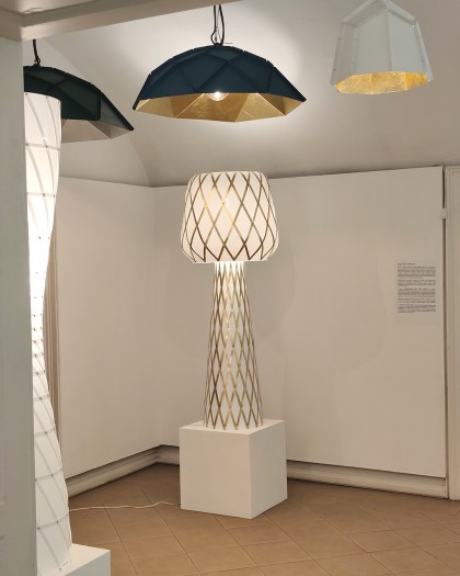 Sculptural lighting objects presented in gallery environment