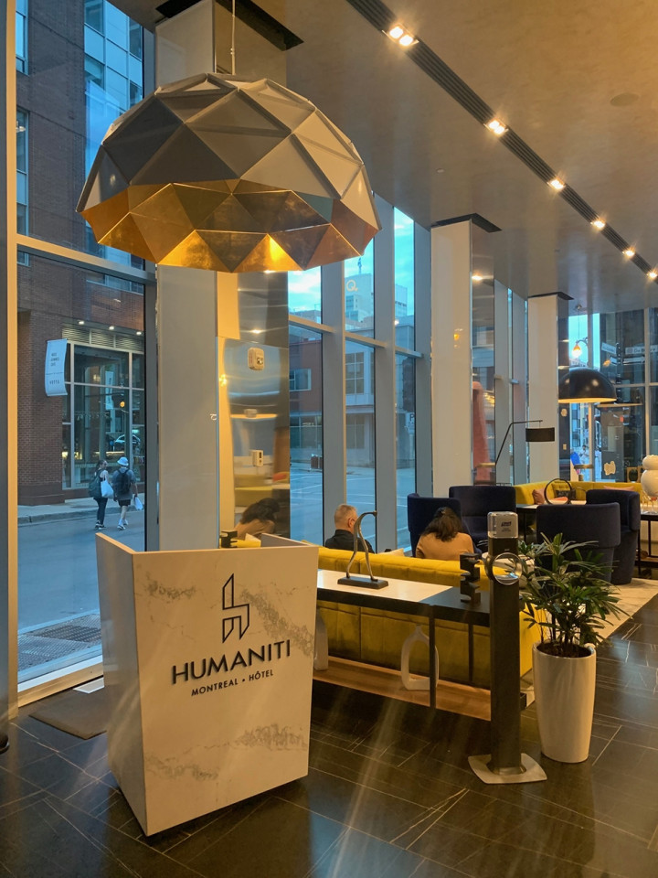 adamlamp sun chandelier gold 140 humaniti monreal lobby autograph collection 