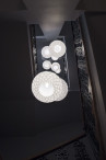 Adamlamp geometric ceiling light installation casati hotel budapest lobby lighting 