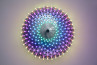 A wall-mounted lamp featuring a pixel LED light, showcasing modern design and functionality in a stylish setting.